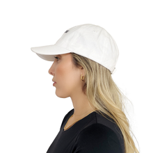Load image into Gallery viewer, Champagne Cocaine hat styled on model, white dad hat women