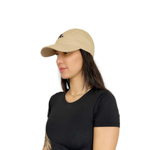 Load image into Gallery viewer, Zodiac Sign embroidered khaki dad hat, styled on model